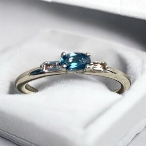 NWOT Elegant Silver Blue and White Topaz Ring